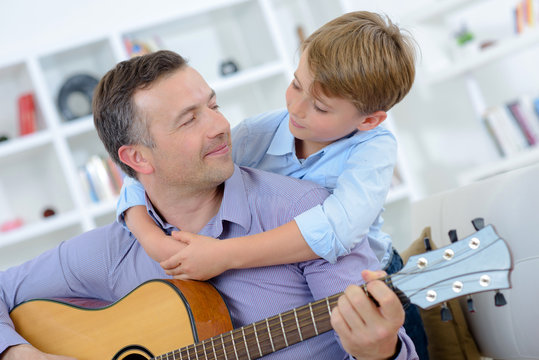 Man Playing Guitar