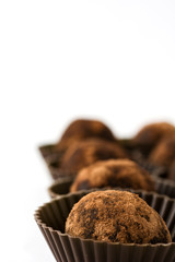 Homemade chocolate truffles isolated on white background

