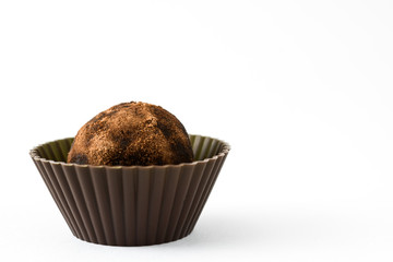 Homemade chocolate truffles isolated on white background

