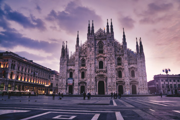 Fototapeta na wymiar Piazza del Duomo and the Duomo, Gothic style cathedral at sunrise, Milan, Lombardy, Italy