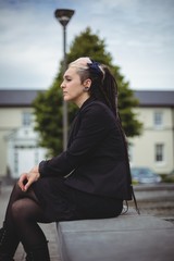 Thoughtful businesswoman relaxing