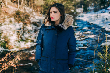 Young Smiling Girl in her Winter Warm Clothing