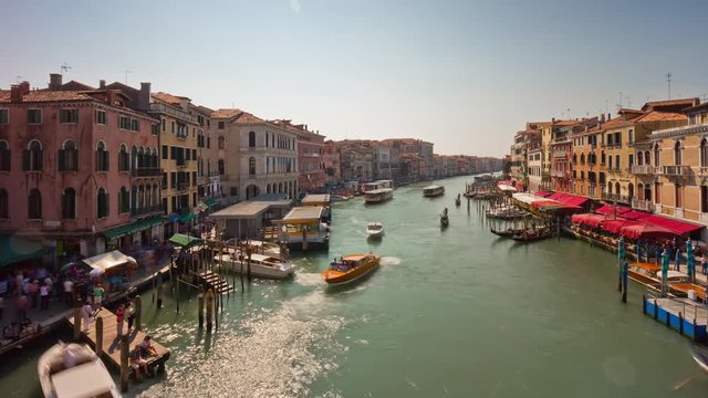 sunny day venice city famous rialto bridge grand canal traffic panorama 4k time lapse italy
