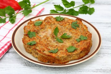 Meat cake from mincemeat, eggs, breadcrumbs & spices
