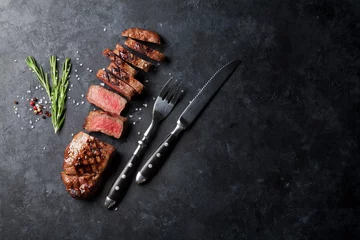 Deurstickers Steakhouse Gegrilde gesneden biefstuk