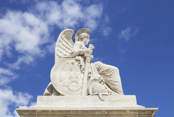 Obraz premium Ancient sculpture in Tuileries garden - Garden located between Louvre Museum and Place de la Concorde, was created by Catherine de Medici in 1564.