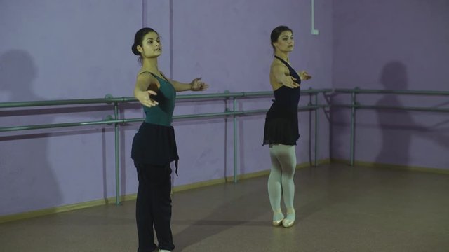 two beautiful ballerina dancing