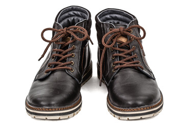 Pair of new boots, isolated on white background