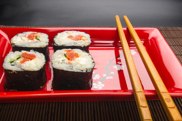 still life - set the rolls on a red plate