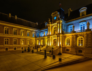 Fototapeta premium Beautiful night view of the Palace of Justice in Amiens, Paris, France.