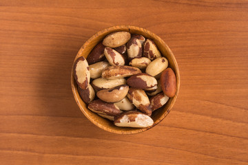 Brazilian Nuts into a bowl. Castanha do Para