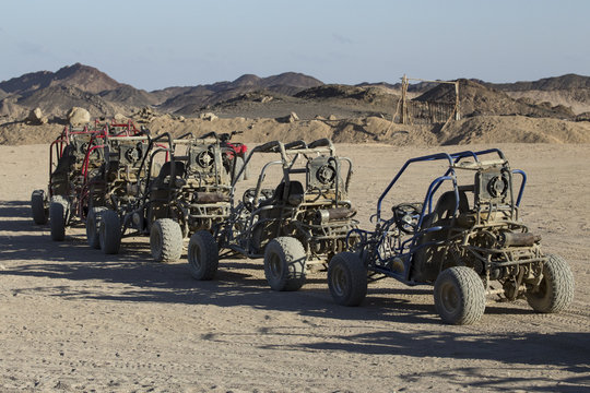 Column pleasure buggies in the desert. Egypt.