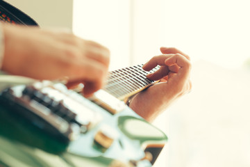 man playing electric guitar © fotofabrika
