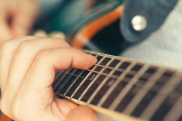 man playing electric guitar © fotofabrika