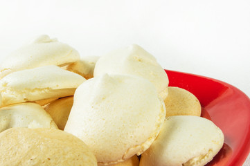 red plate with meringues