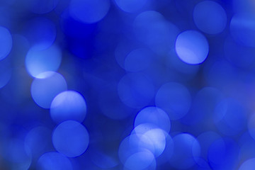 Blue bokeh background. Image with copy space.
