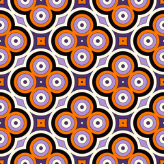 Seamless pattern in Halloween traditional colors. Abstract background with bright geometric ornament.