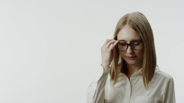 Portrait of sad girl with glasses