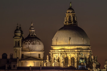Italy beauty, detailed view to cupolas of cathedral Santa Maria della Salute in the evening in Venezia, Venice