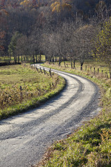 Fototapeta na wymiar Curved gravel road in countryside