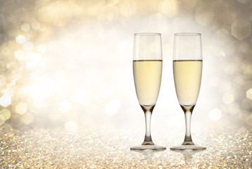 Toast champagne, happy new year, golden background
