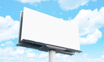 Billboard with empty screen, against blue cloudy sky