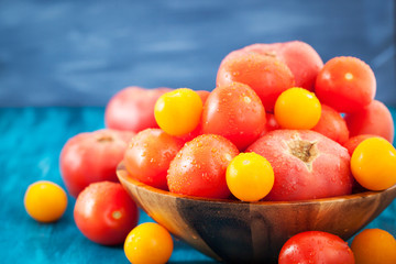 Fresh ripe red and yellow tomatoes