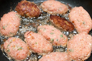 cutlets fried in a pan
