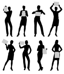 Isolated silhouettes of a business woman holding paper