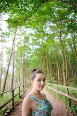 Young girl on a walk in the forest