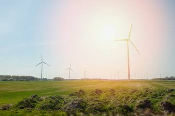 Obraz premium Bright blue sky moving and wind turbine