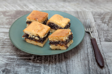 Homemade cake with jam and poppy seed