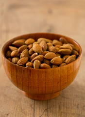 almonds on wooden surface