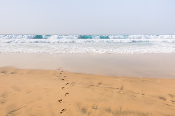 Fototapeta na wymiar Footprints at the beach