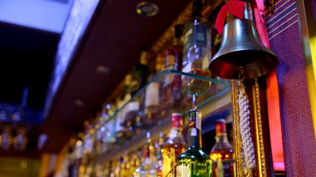 The bartender informs the client about the readiness of order.
