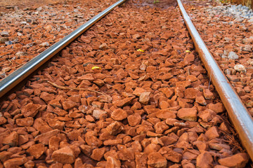 red rock and Railway Tracks , stone background