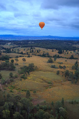 Hot air balloon over landscape