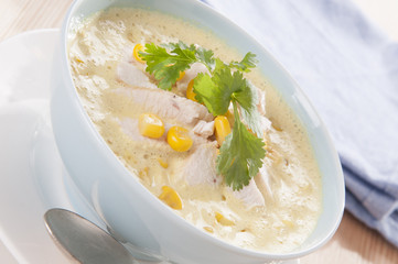 corn with slices of turkey, soup, cream 
