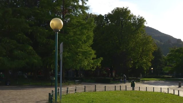 famous como lake sunny evening volta temple garden panorama 4k italy
