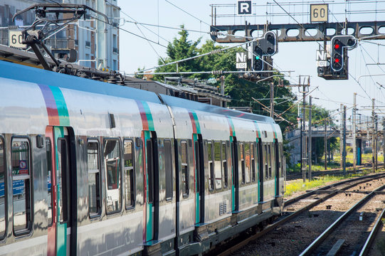 Modern speed passenger train on railways station.