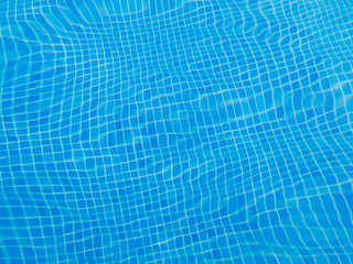 Pattern water blue background in swimming pool 