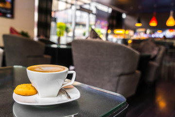 Latte Coffee art on the table .