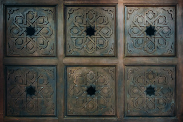 Vintage old brown wood door with patterns