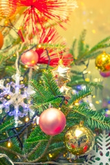 Obraz na płótnie Canvas Closeup of Christmas tree decorations background ( Filtered imag