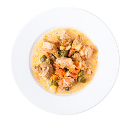 Baked pork meat with vegetables.