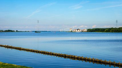 Fototapeta premium The bird sanctuary of Veluwemeer under blue sky near the town of Nijkerk in the Netherlands