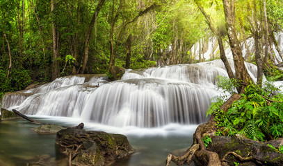 Fototapeta na wymiar Beautiful waterfall in the deep forest,Pha Tat Waterfall, Kancha