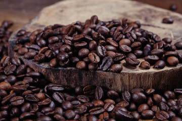 Coffee Bean on wood background with filter effect retro vintage