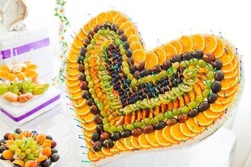 Wedding reception with fruits and cakes