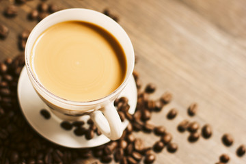 Coffee Beans And Coffee Cup Background./ Coffee Beans And Coffee Cup Background 